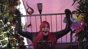 www.bondagecrossdresser.com - Tied to a grid in Latex Catsuit thumbnail